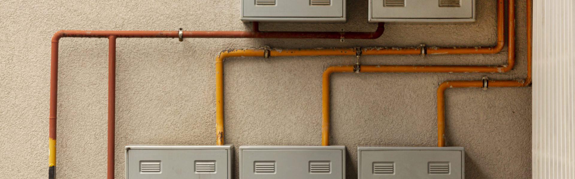 concrete-wall-with-meters-pipes